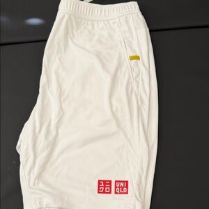 Uniqlo Men’s White Athletic Shorts with Red Logo